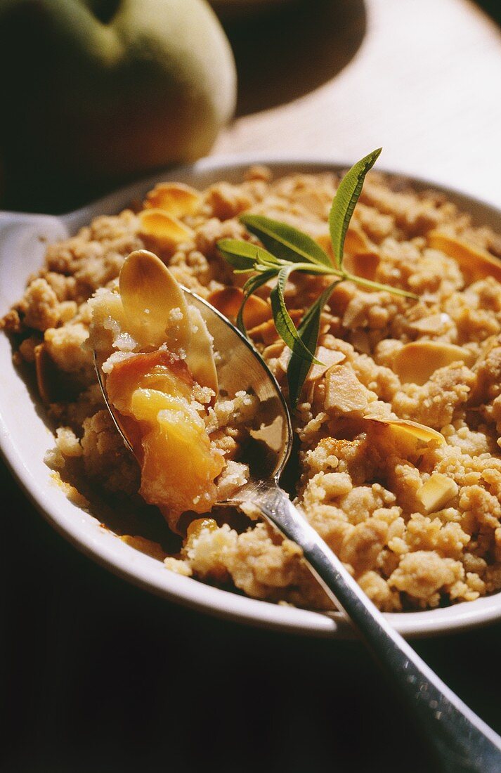 Peach and apricot crumble with vervain
