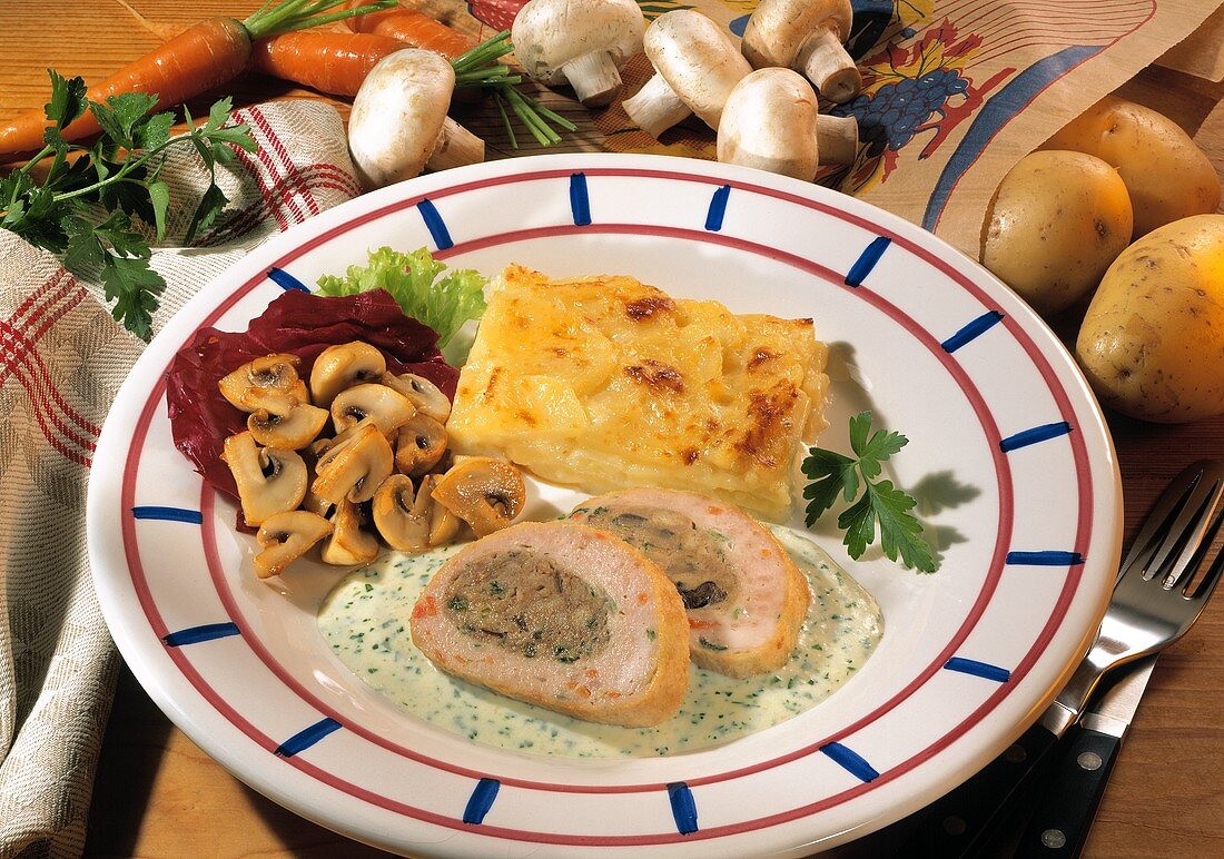 Stuffed veal roulade on herb sauce