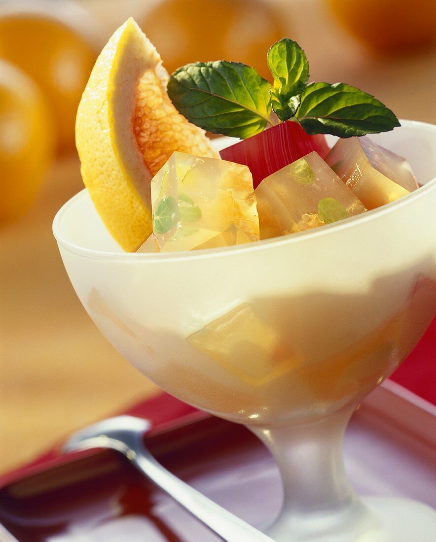 Diced blood orange jelly & grapefruit jelly in dessert bowl