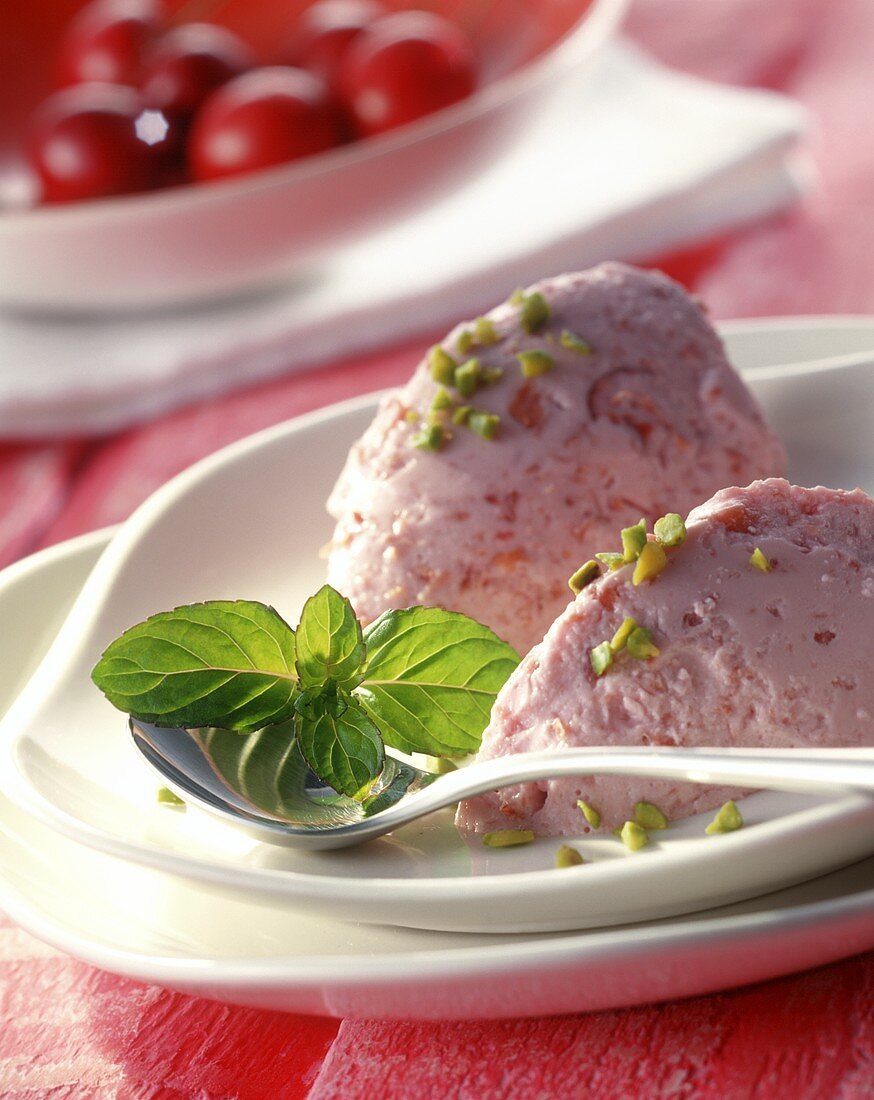 Cherry mousse with pistachios and mint