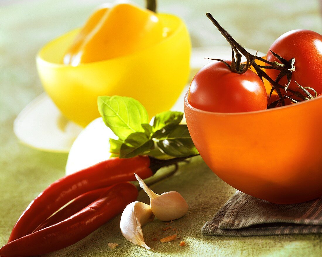 Still life with peppers, chillies, tomatoes & garlic