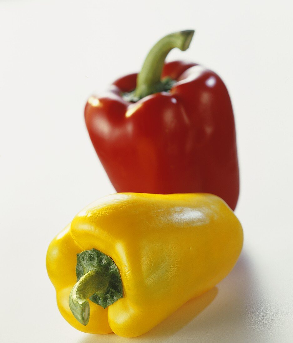 Yellow pepper in front of red pepper