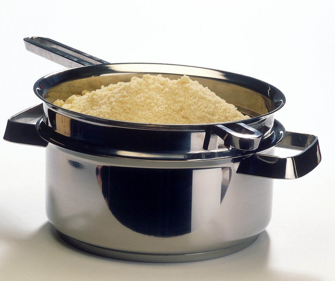 Cooked couscous in pot