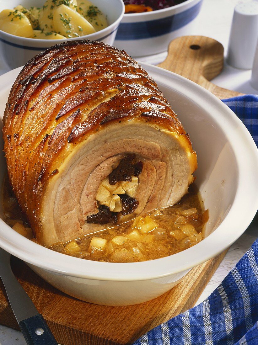 Norwegian roast pork roll with apple and plum stuffing