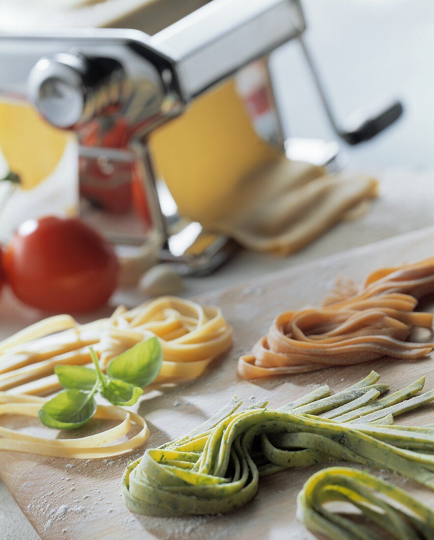 Still life with home-made noodles and pasta machine