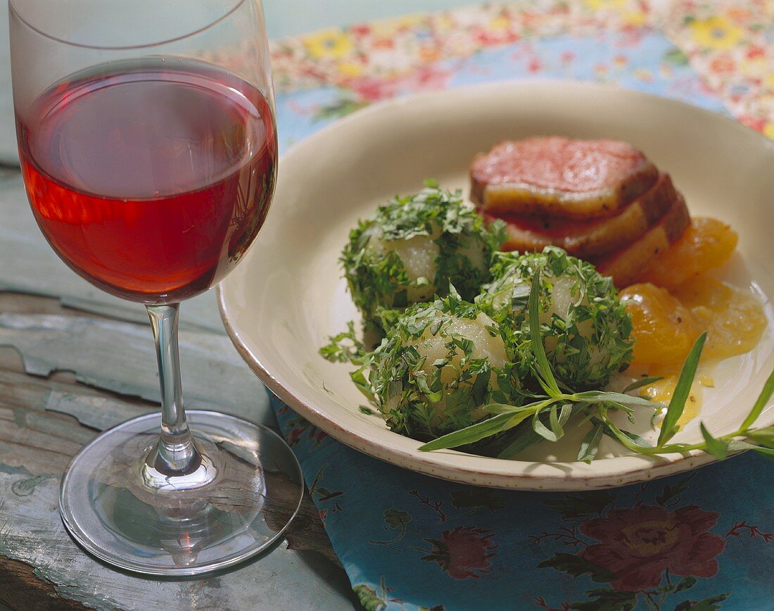Herb dumplings with duck breast and apricots
