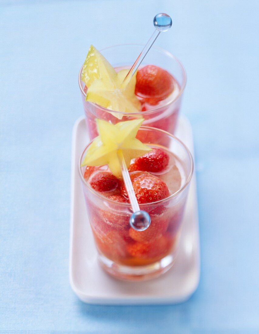 Strawberry cocktail with carambola slices