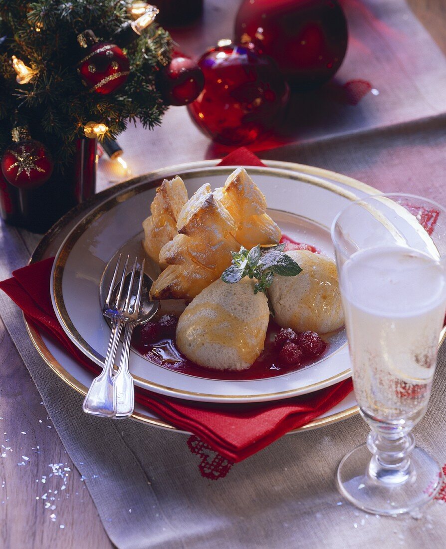 Honey mousse and puff pastry fir trees with berry sauce