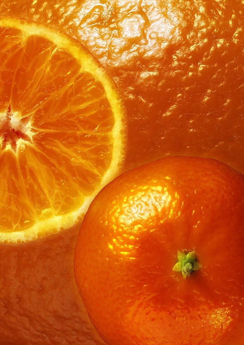 Mandarin halves, background: mandarin peel