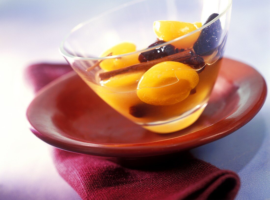 Apricots and plums in brandy