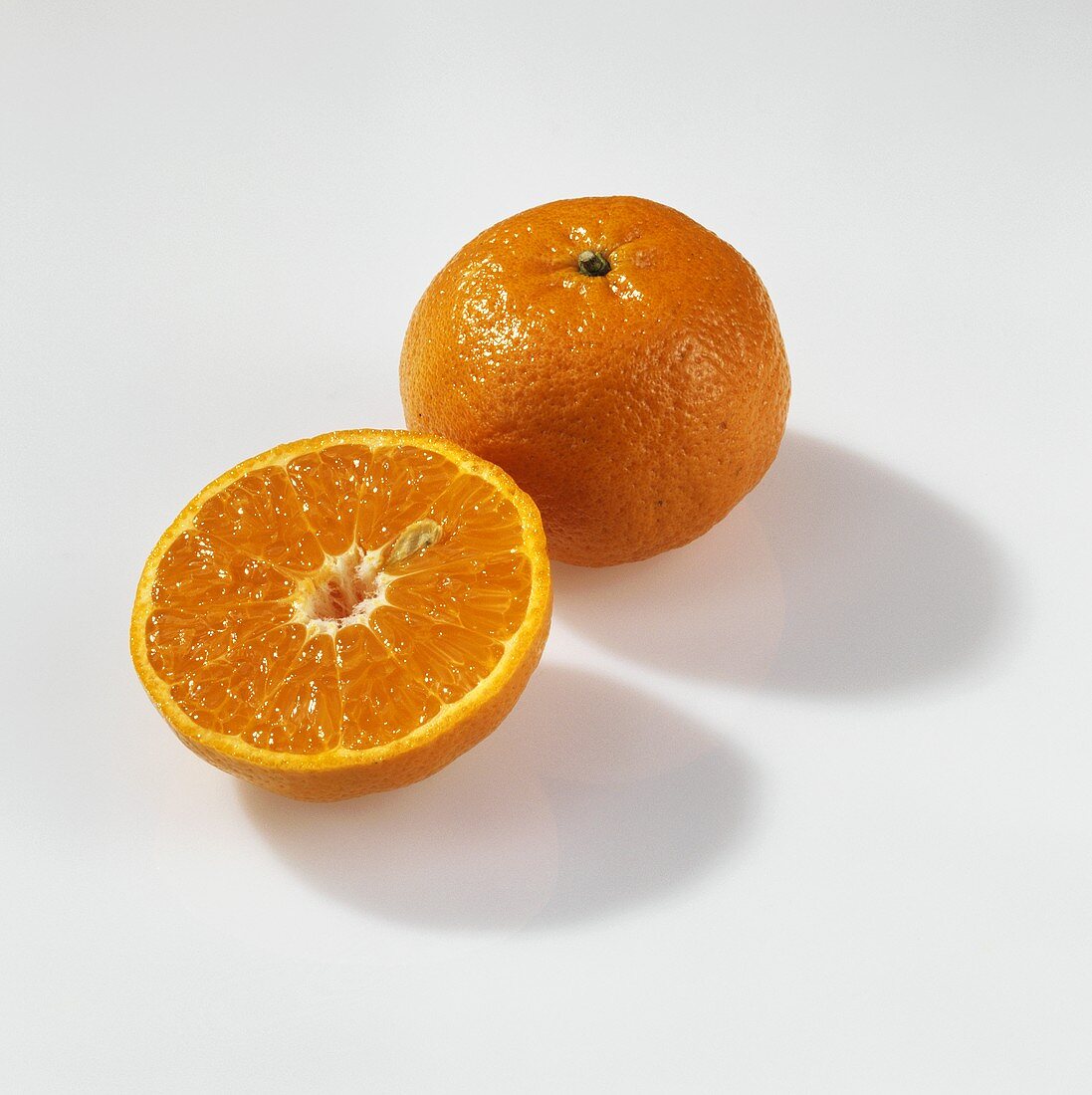 Whole and half mandarin (Clauselina)