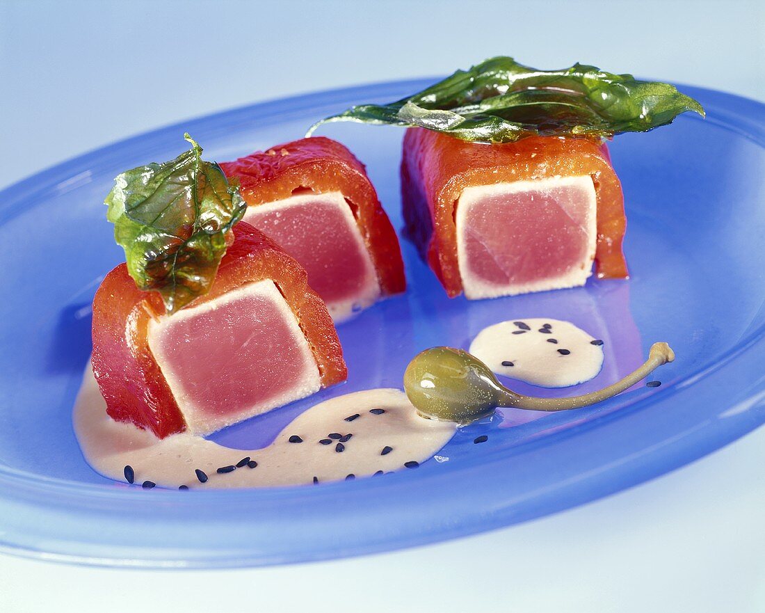 Tuna wrapped in red peppers and capers, sushi style