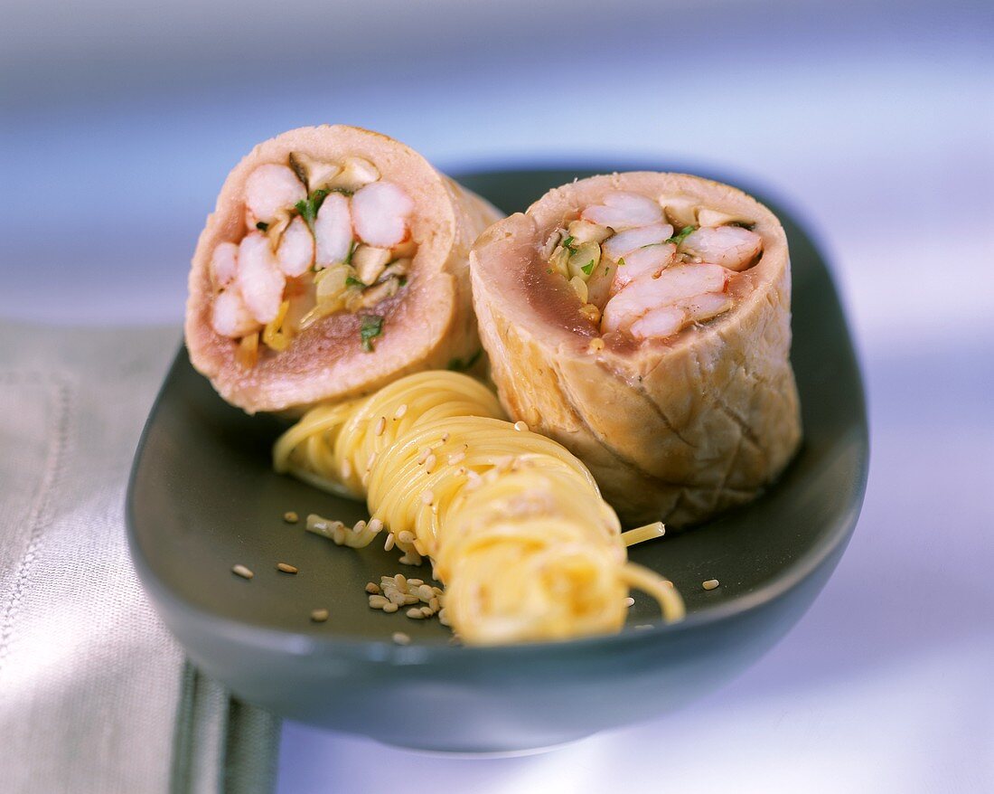 Tuna roulade stuffed with shrimps with sesame noodles