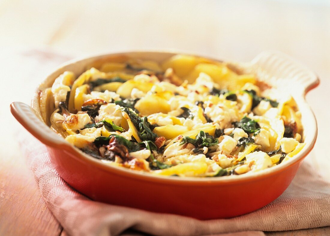 Potato and spinach gratin with goat's cheese