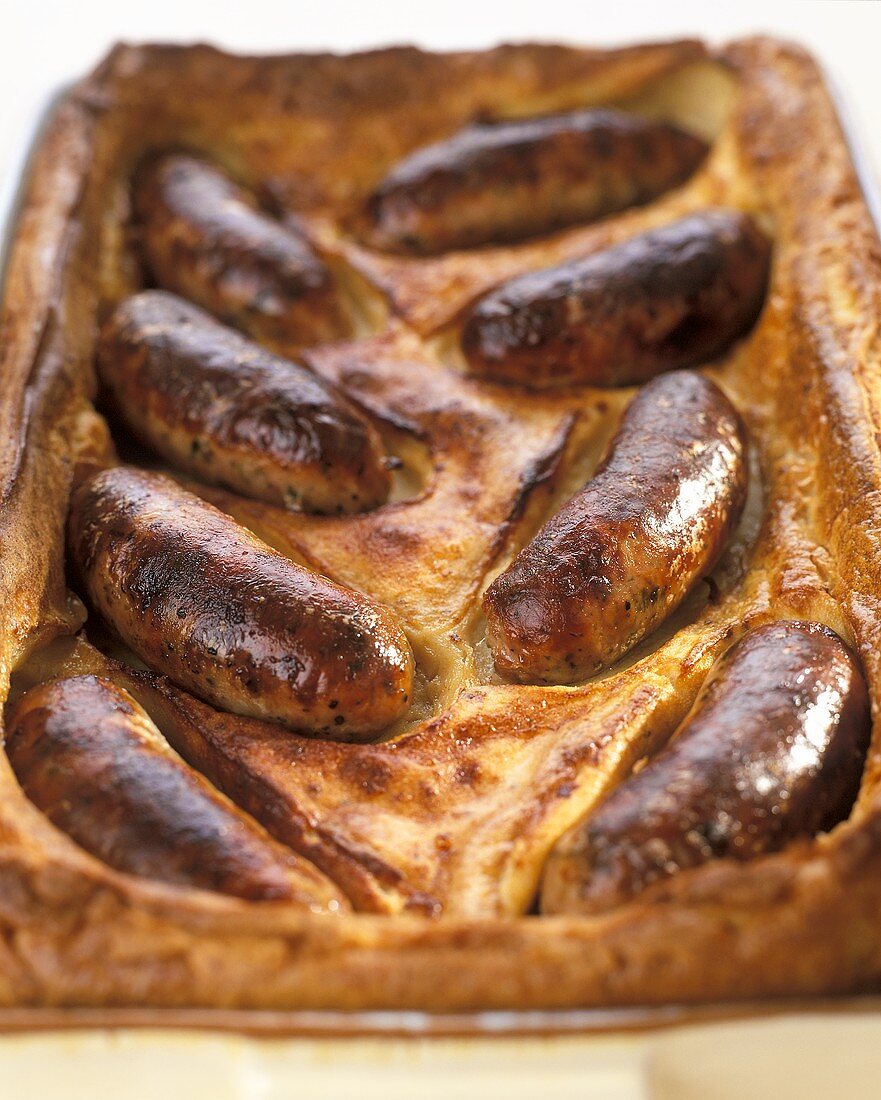 Toad-in-the-hole (Würstchen in Pfannkuchenteig)