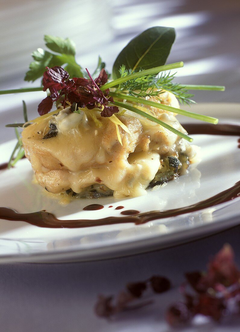 Calf's sweetbread with cheese topping and cassis sauce