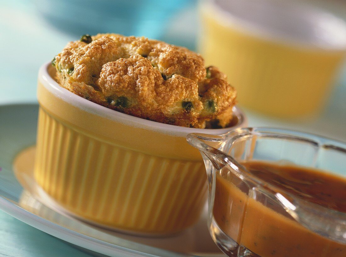 Millet and pea souffle with carrot sauce
