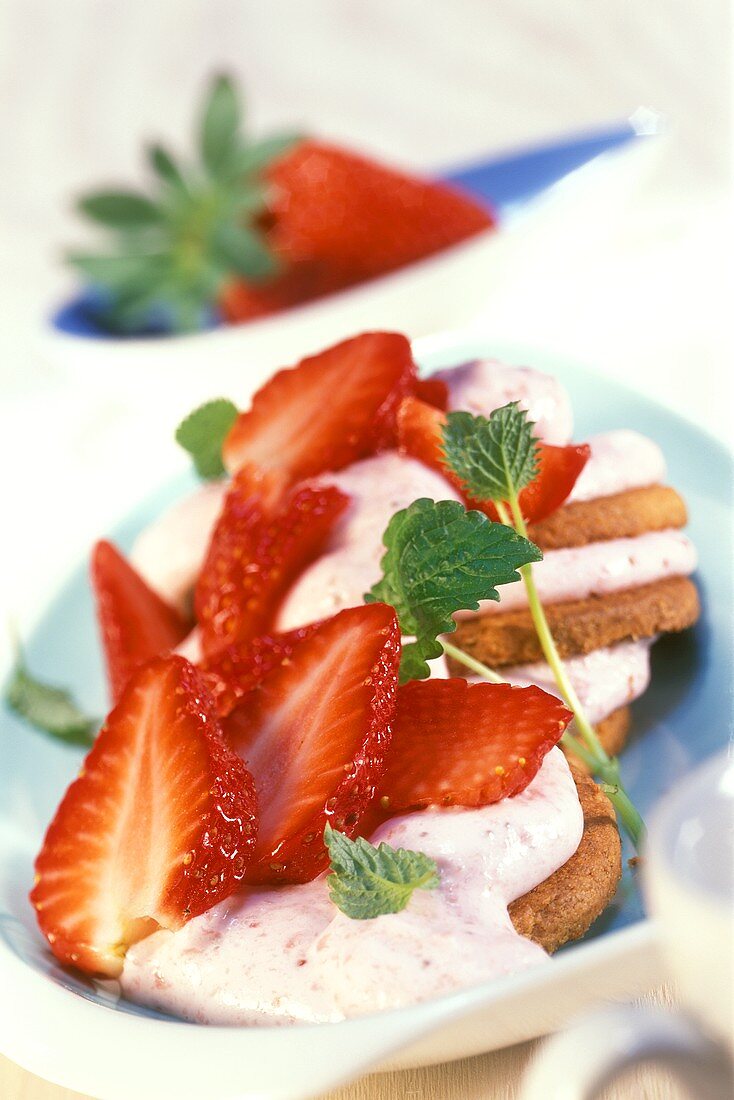 Strawberry quark dessert on wholemeal biscuits