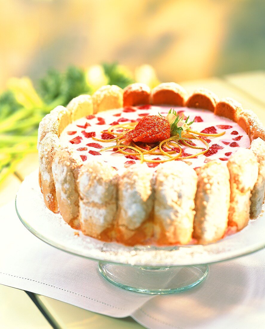 Strawberry charlotte on cake stand