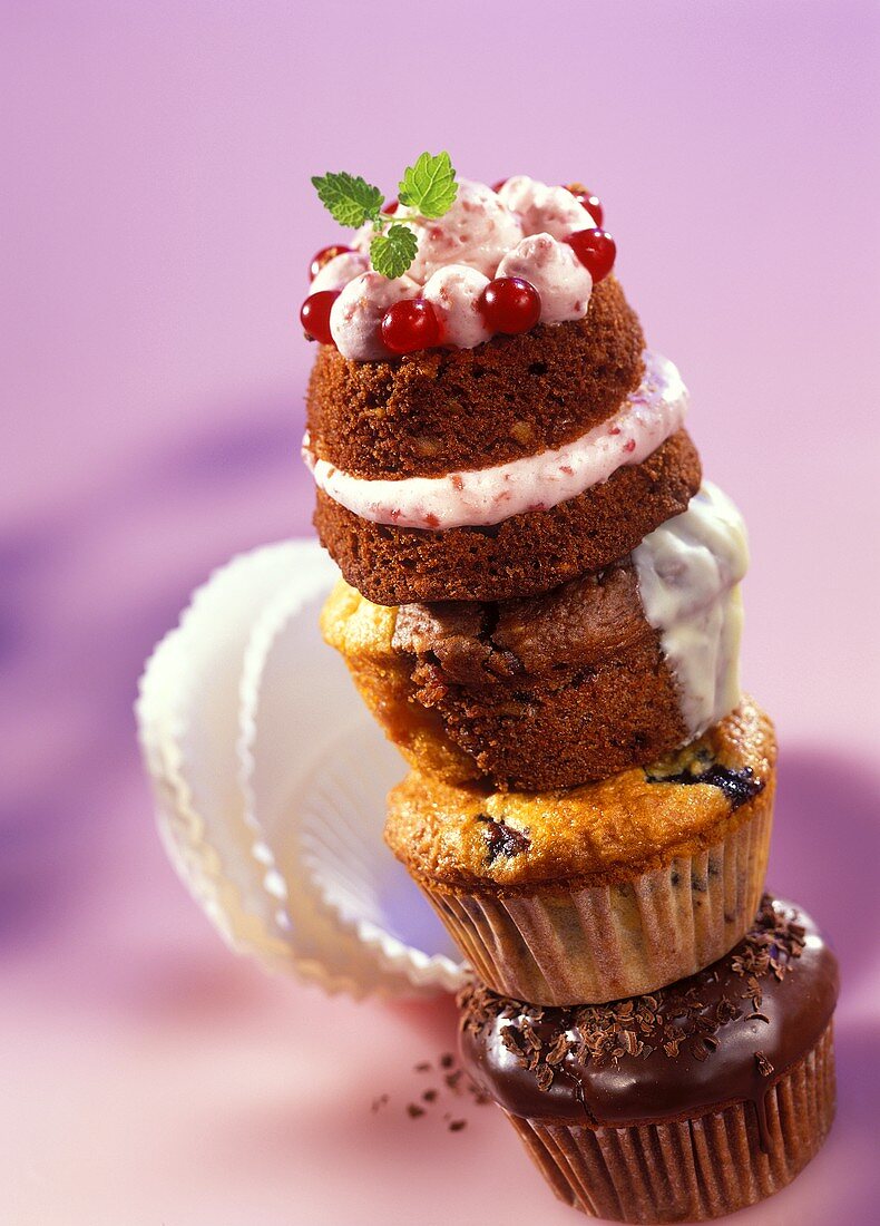 4 muffins on top of each other, top one with redcurrant cream