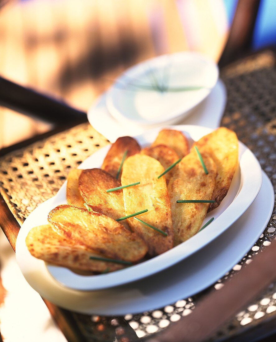 Baked potatoes with garlic dip