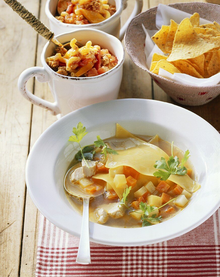 Chicken soup with vegetables and lasagne sheets