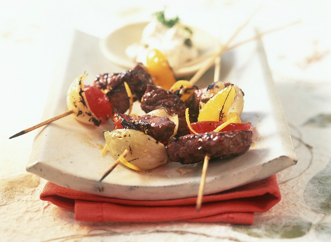 Ostrich meat and vegetable kebabs with peppers