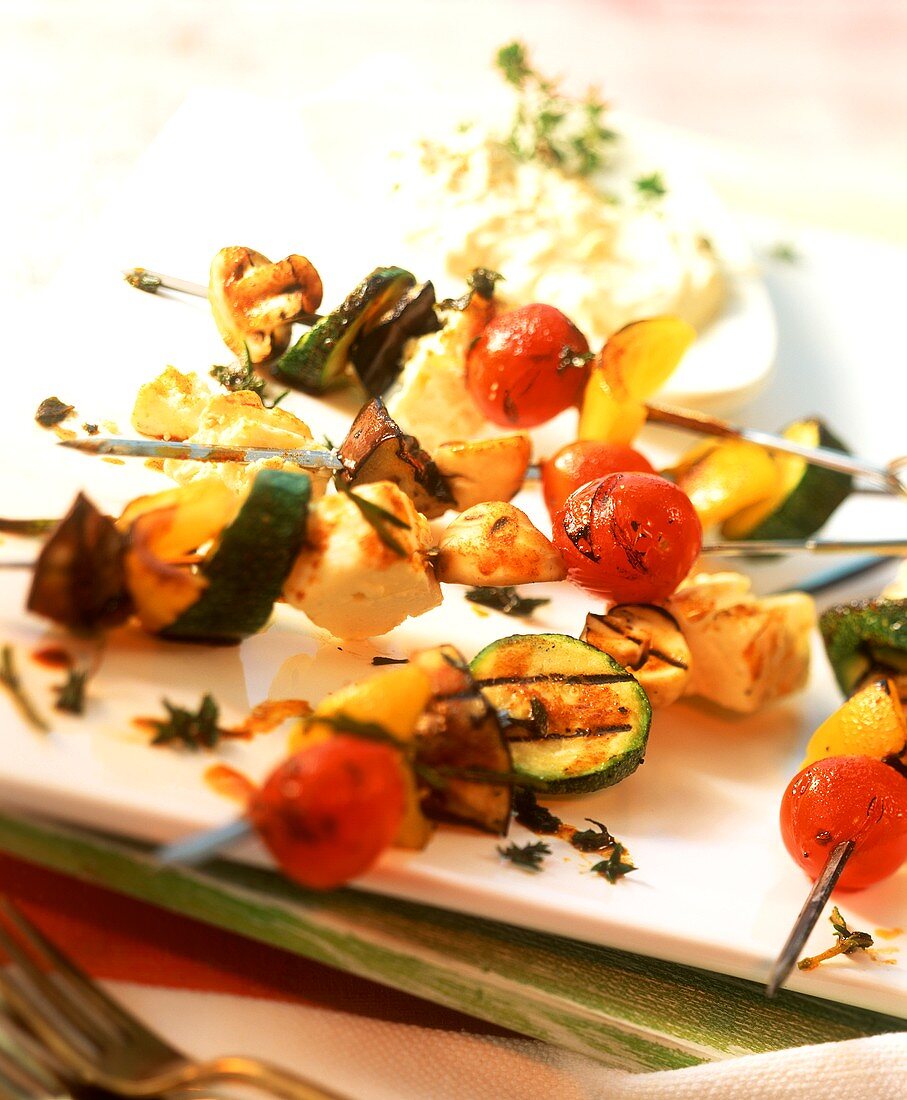 Barbecued vegetable kebabs with sheep's cheese