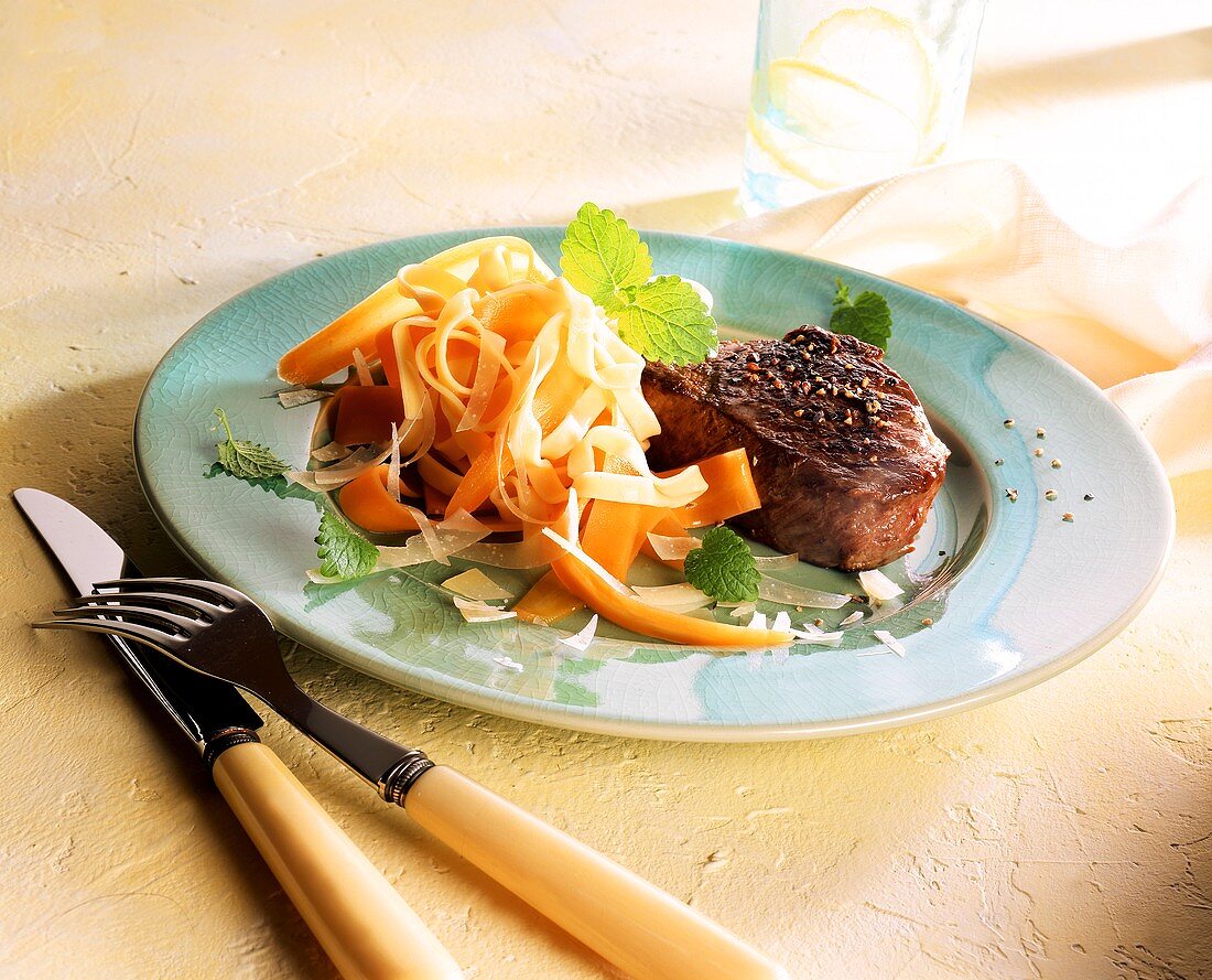 Beef fillet with ribbon pasta and carrots