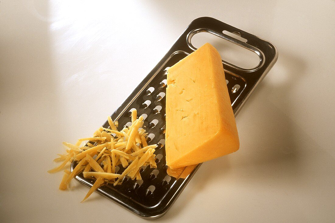 Cheddar in the piece and grated on grater