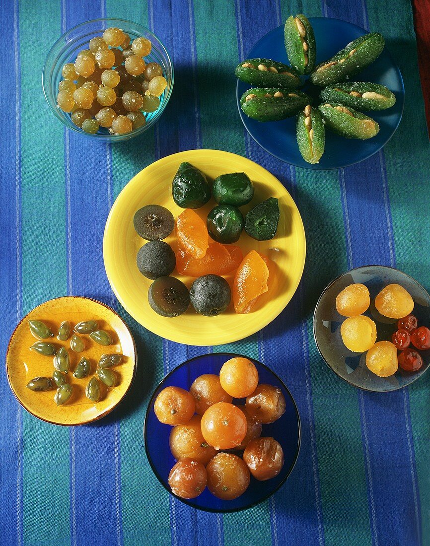 Various candied fruits in bowls
