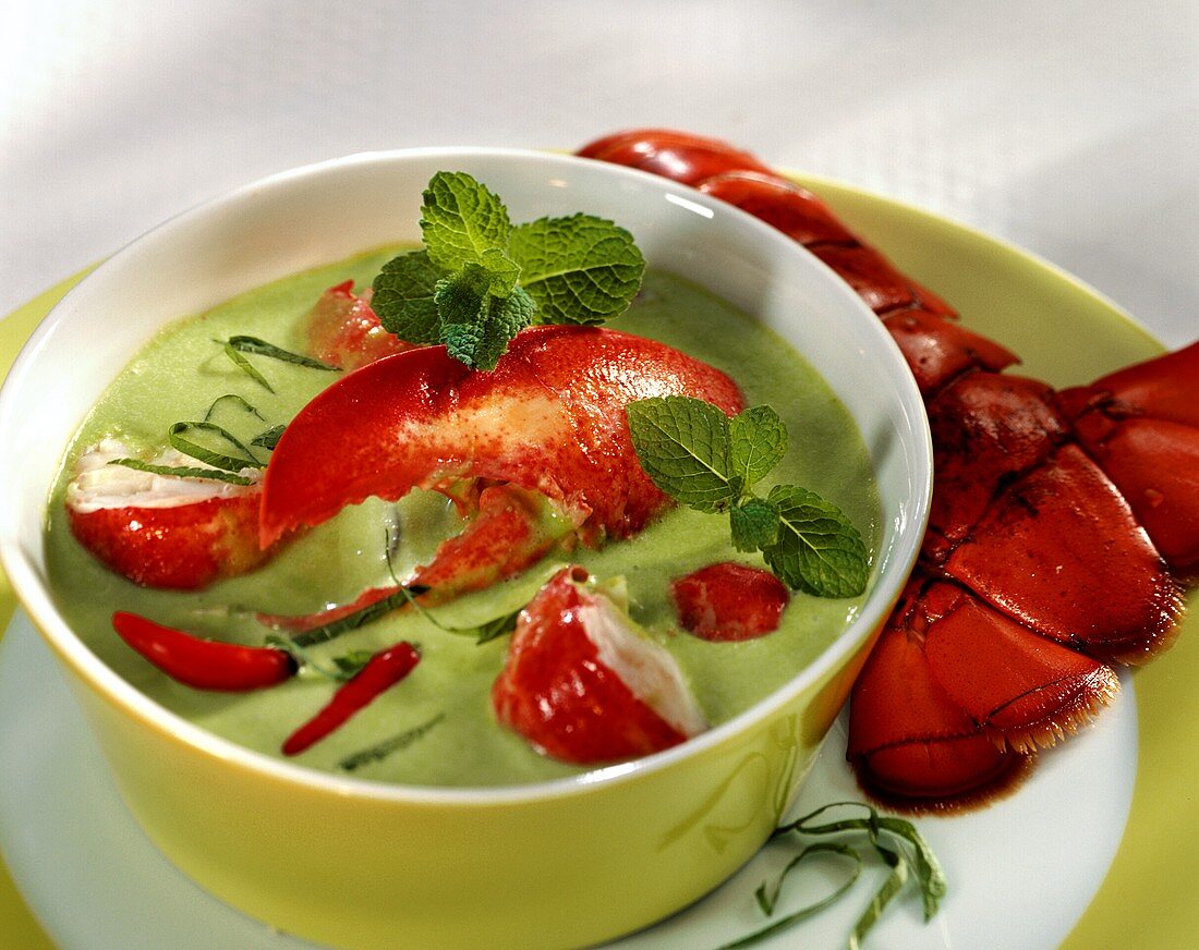 Cold green creamed pea soup with lobster