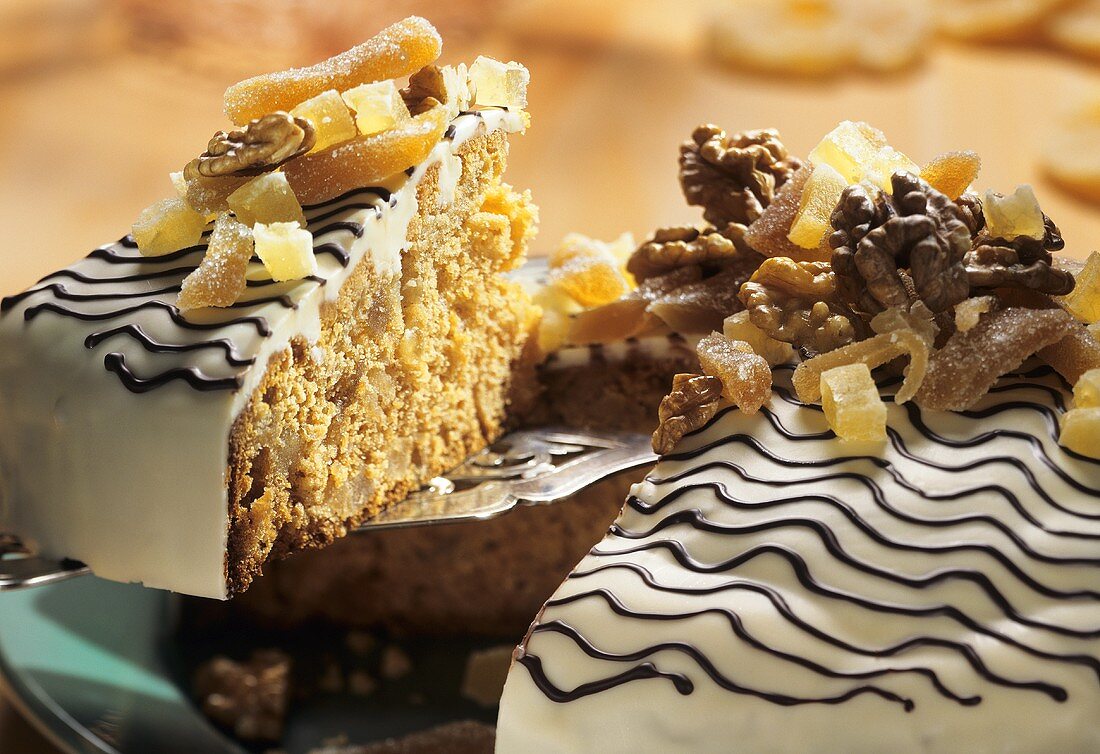 A ginger and marzipan gateau with white chocolate icing