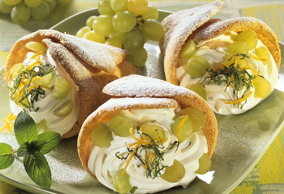 Three sponge cones filled with quark and grapes