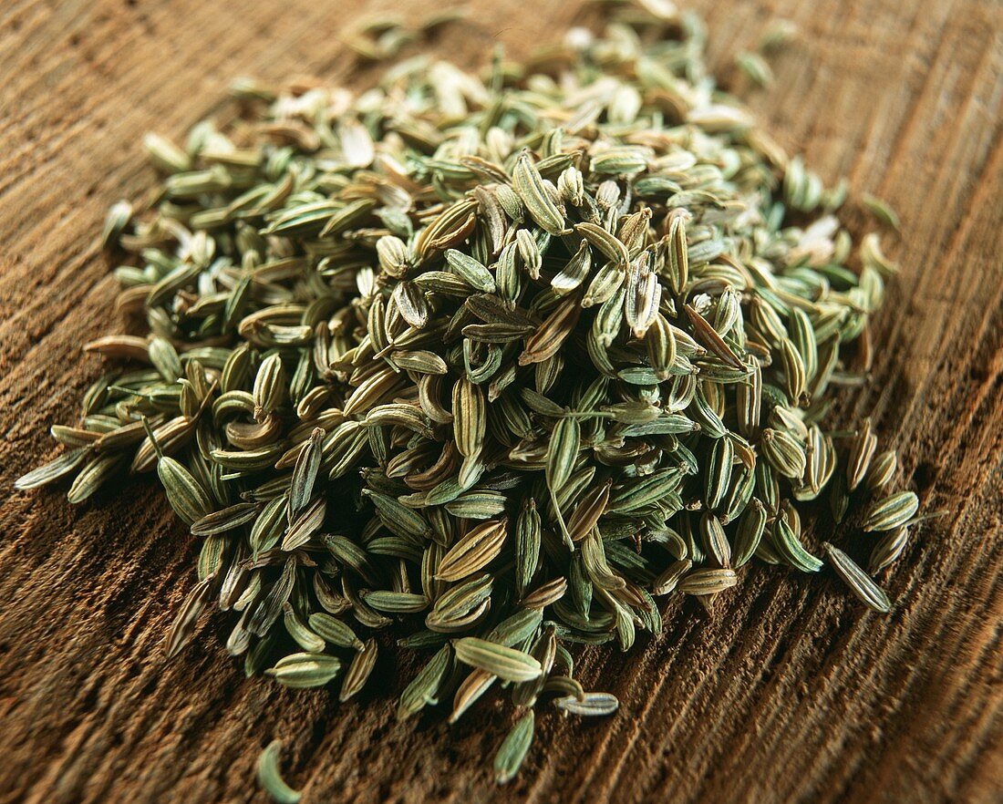 Fennel seed on brown background