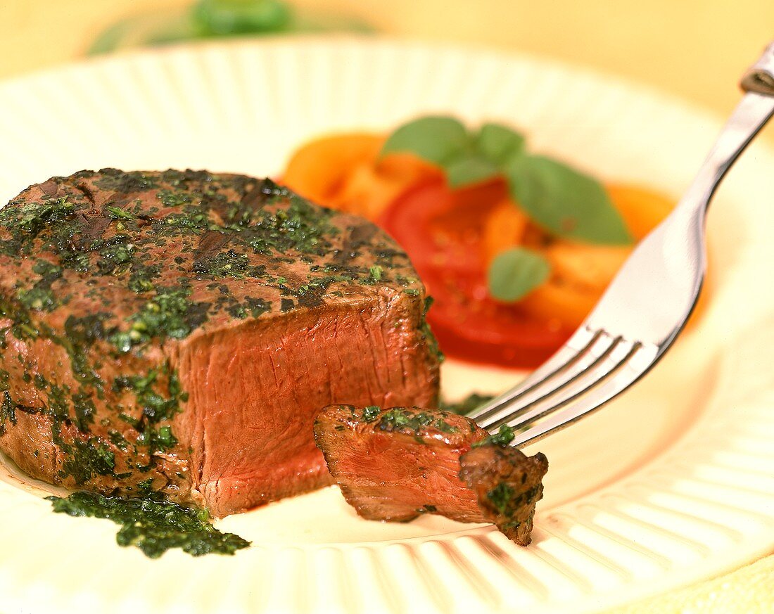 Herb fillet with tomatoes