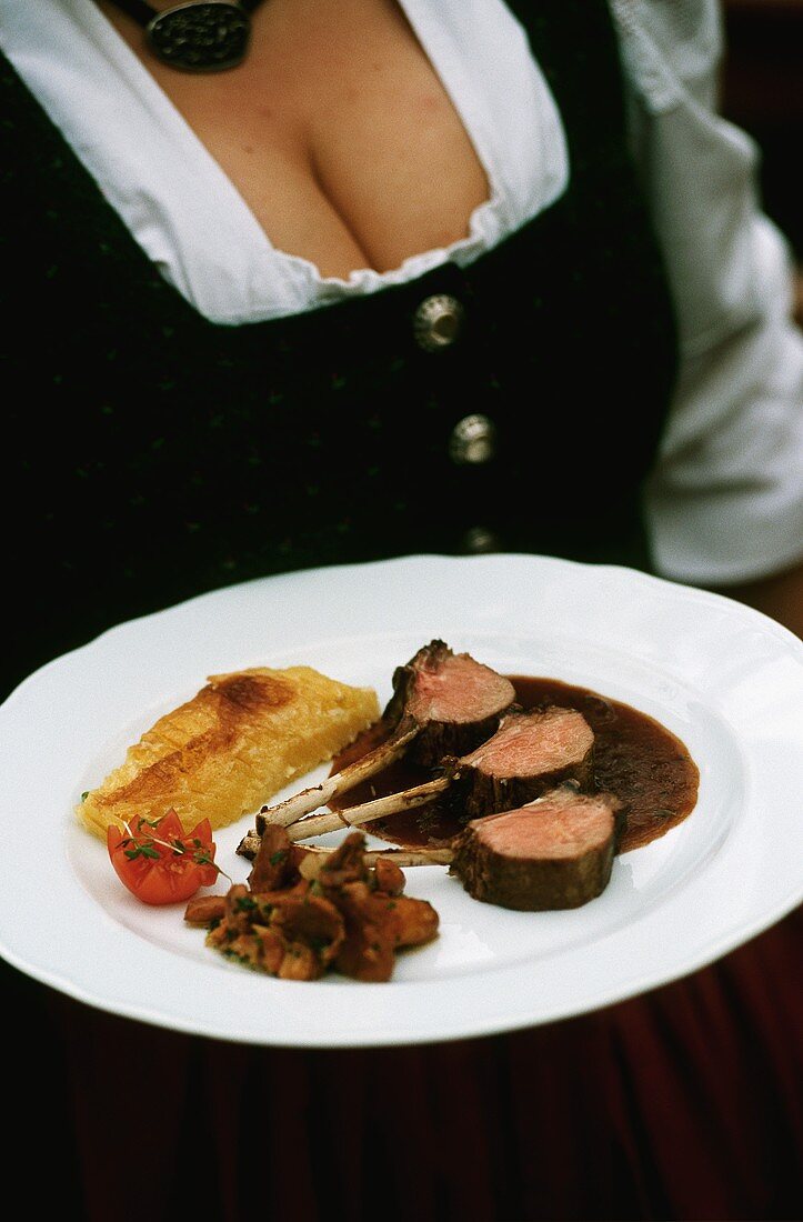 Lamb chop on rosemary jus with potato gratin