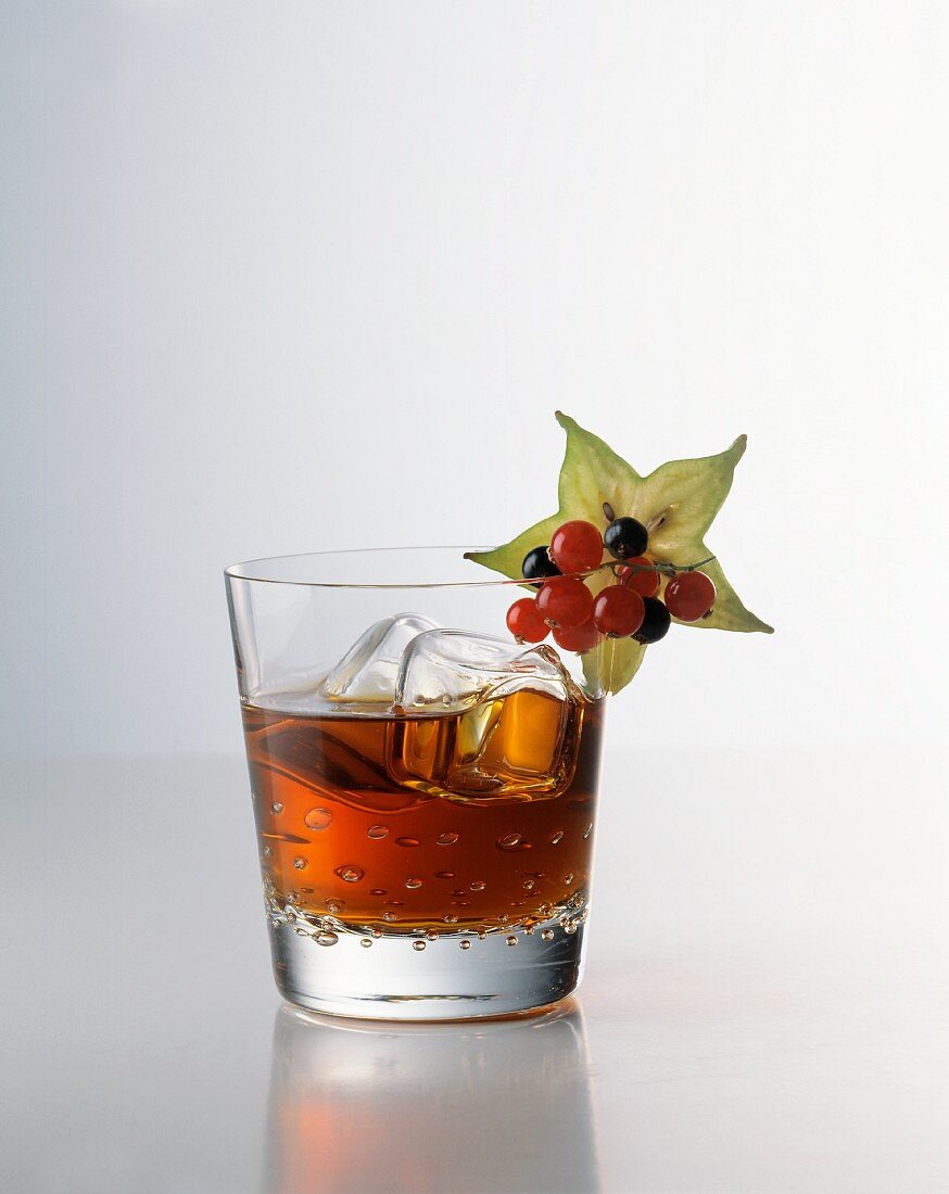 A Black Sun: Cocktail with Coinreau, Rum and Cola