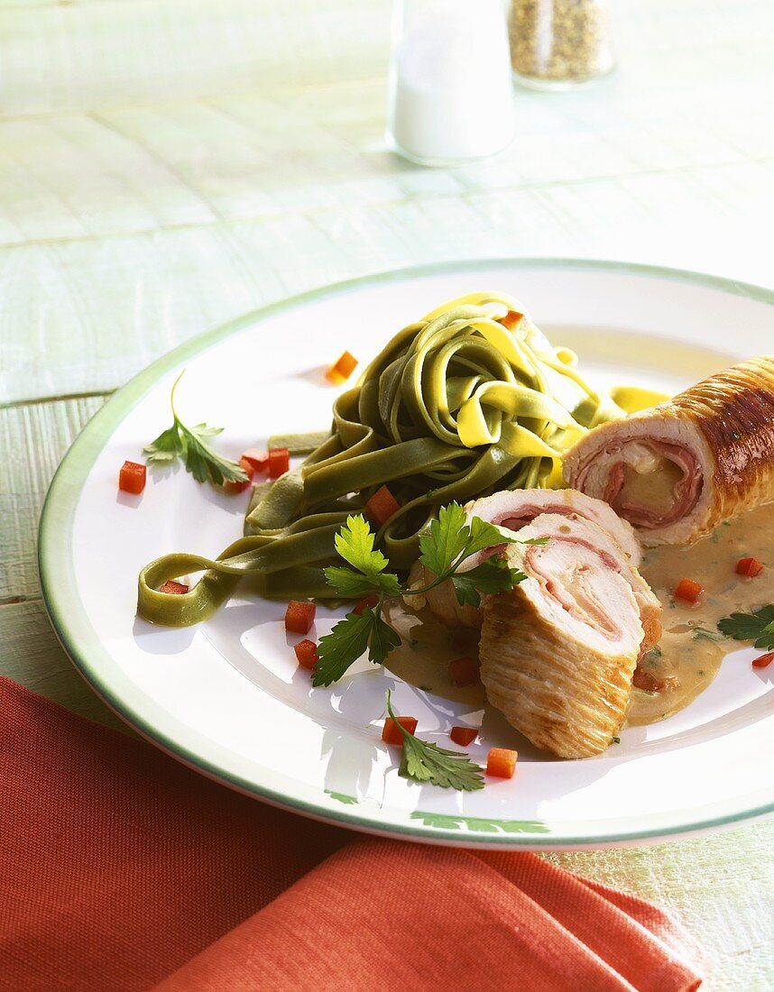 Turkey roulade filled with cheese & ham, green ribbon pasta