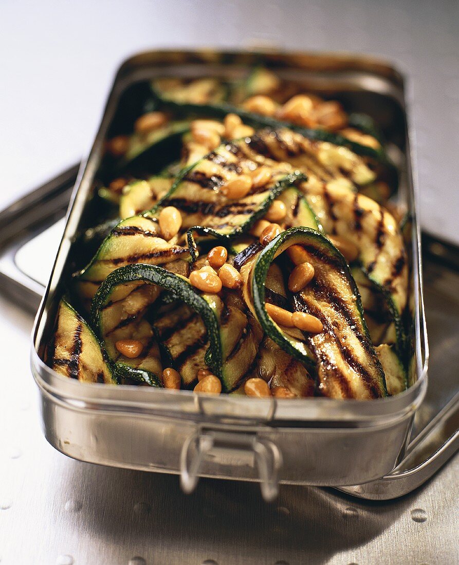 Grilled courgettes with pine nuts