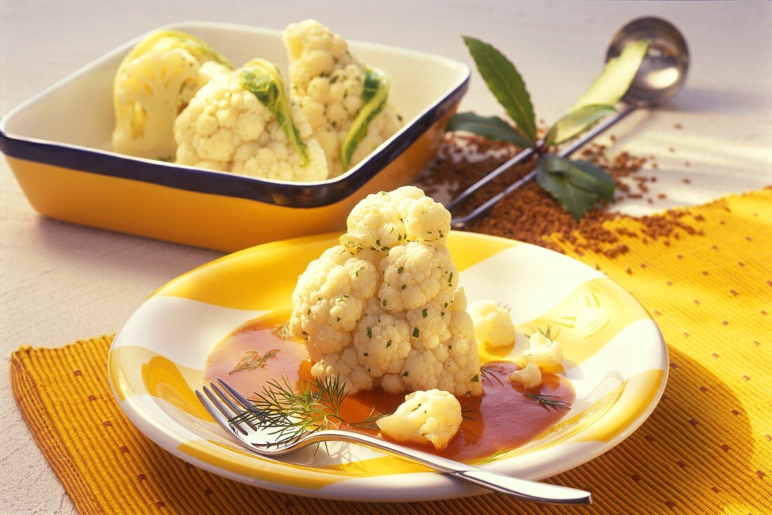 Baked cauliflower with tomato and mustard sauce