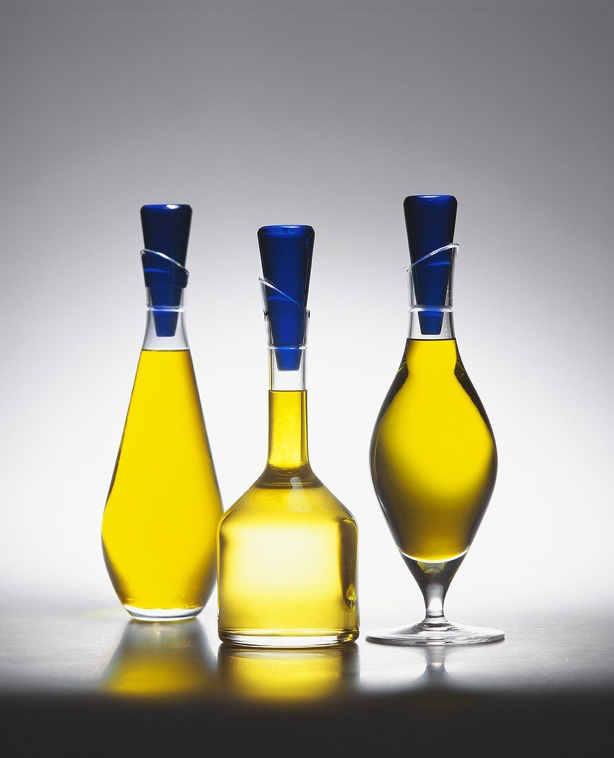 Three bottles of olive oil