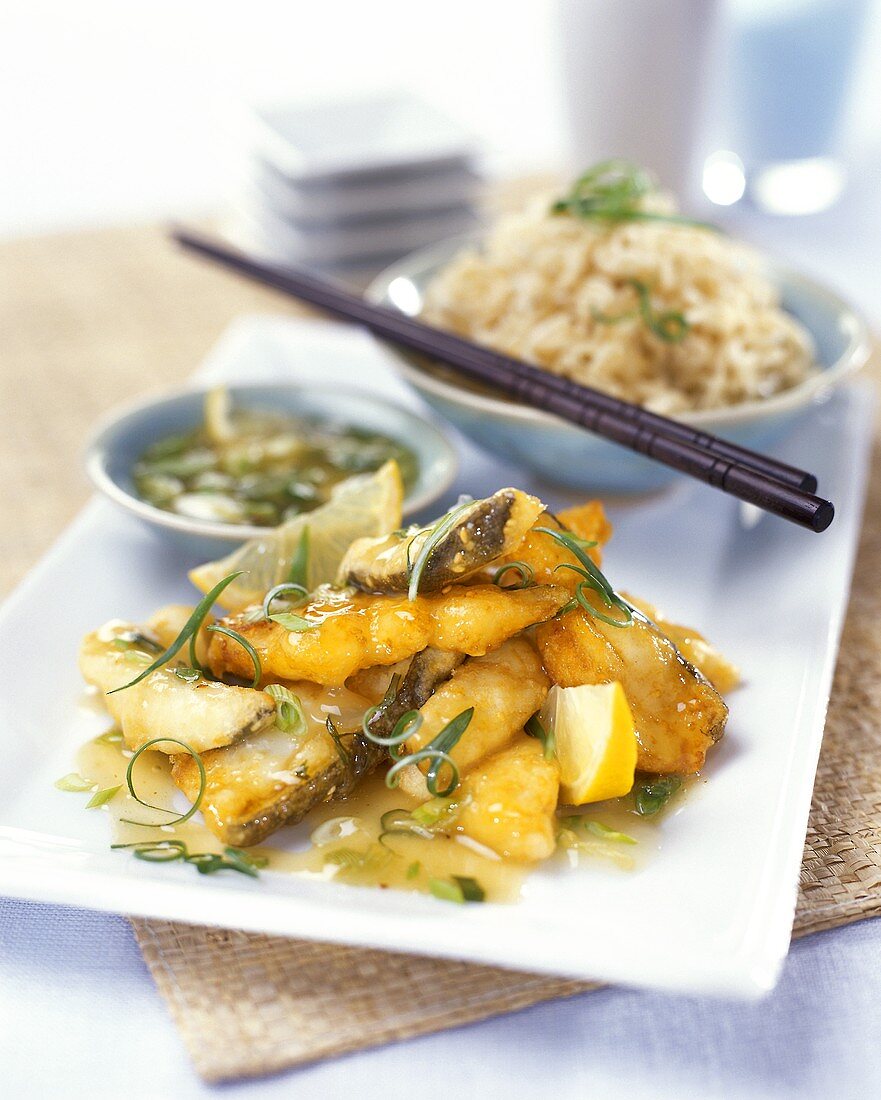 Fried fish in sweet and sour sauce with rice