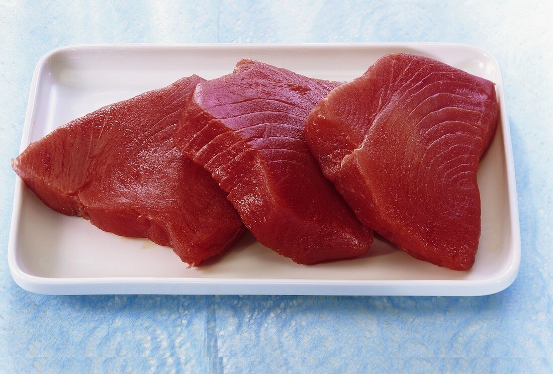 Three tuna steaks
