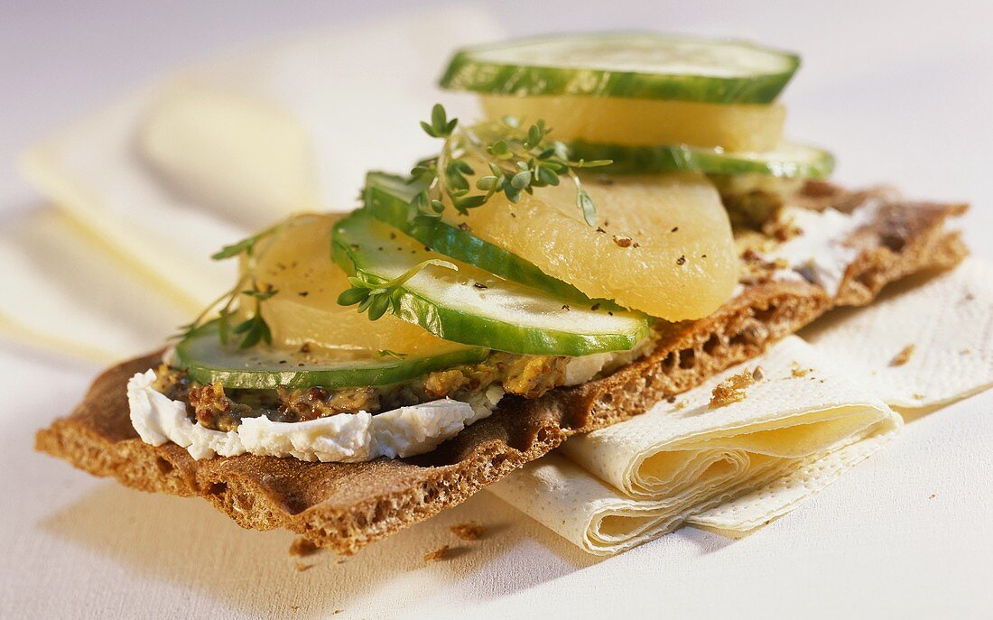 Crispbread topped with Harz cheese and cucumber slices