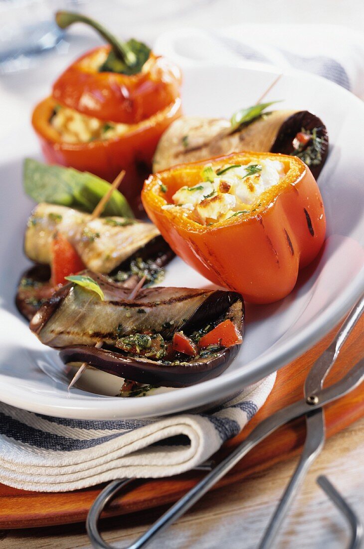 Barbecued aubergine escalope and stuffed peppers