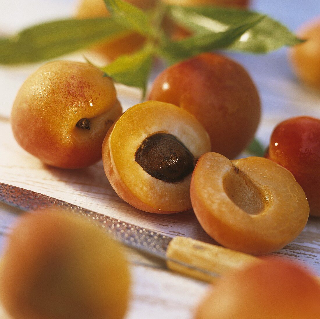 Whole and halved apricots
