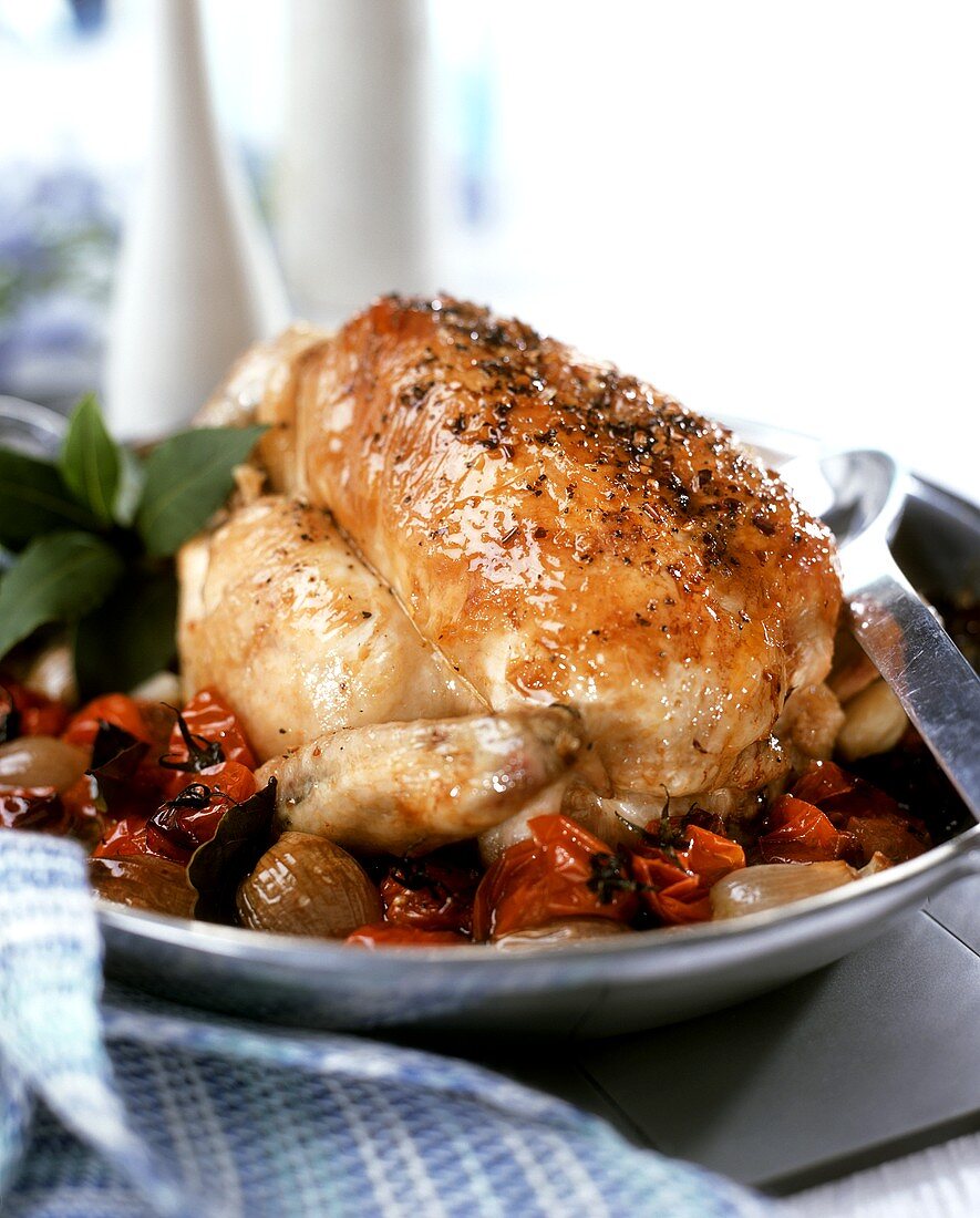 Roast chicken on vegetables 