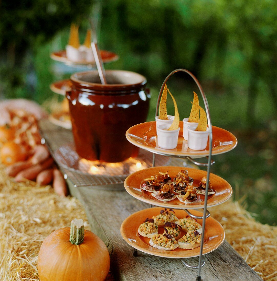 Rustic open-air buffet for a Halloween party