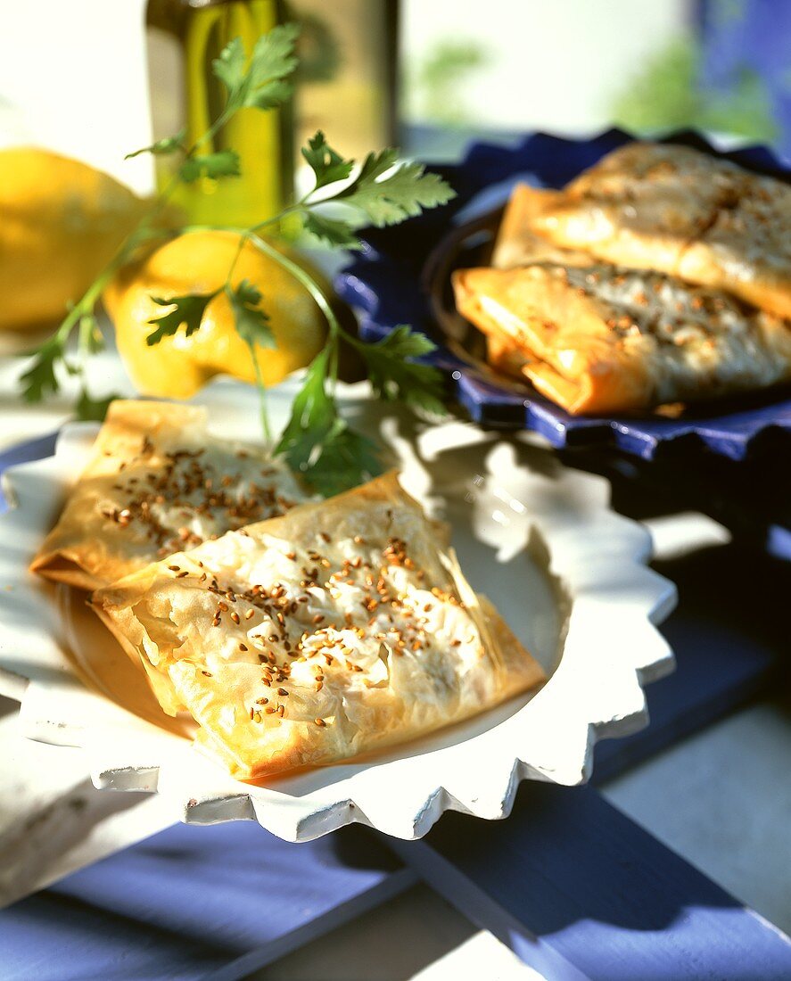 Filo pastry parcels with sheep's cheese filling & sesame